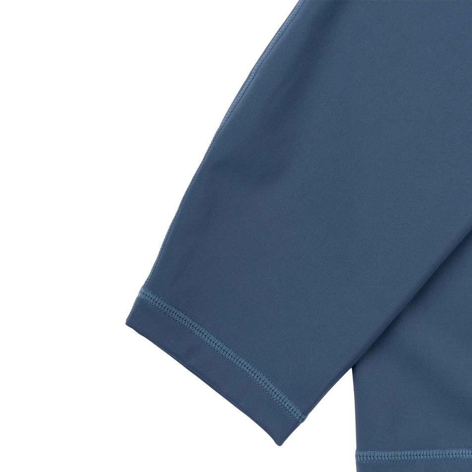 The ankle cuff of the Ronhill Women's Tech Contour Tight in the Evening Haze colourway.