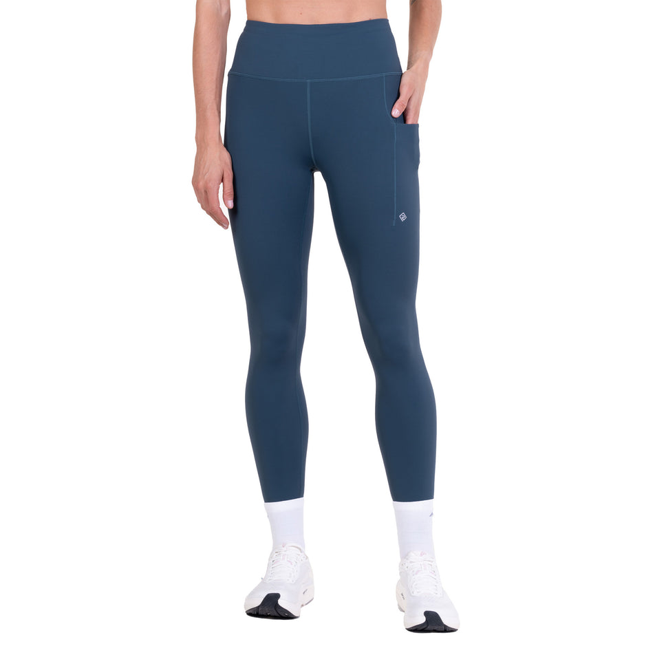 Front view of a model wearing the Ronhill Women's Tech Contour Tight in the Evening Haze colourway.