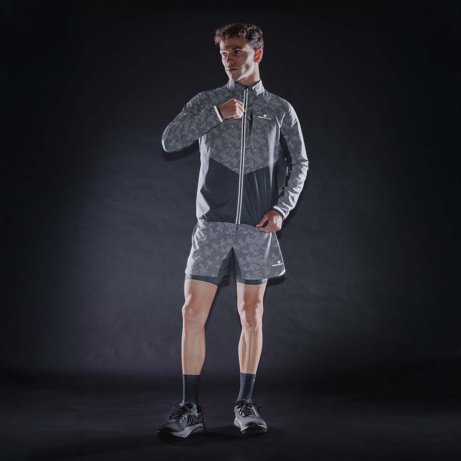 The reflective print on the Ronhill Men's Tech Reflect Lux Jacket in the Black/Reflect colourway.