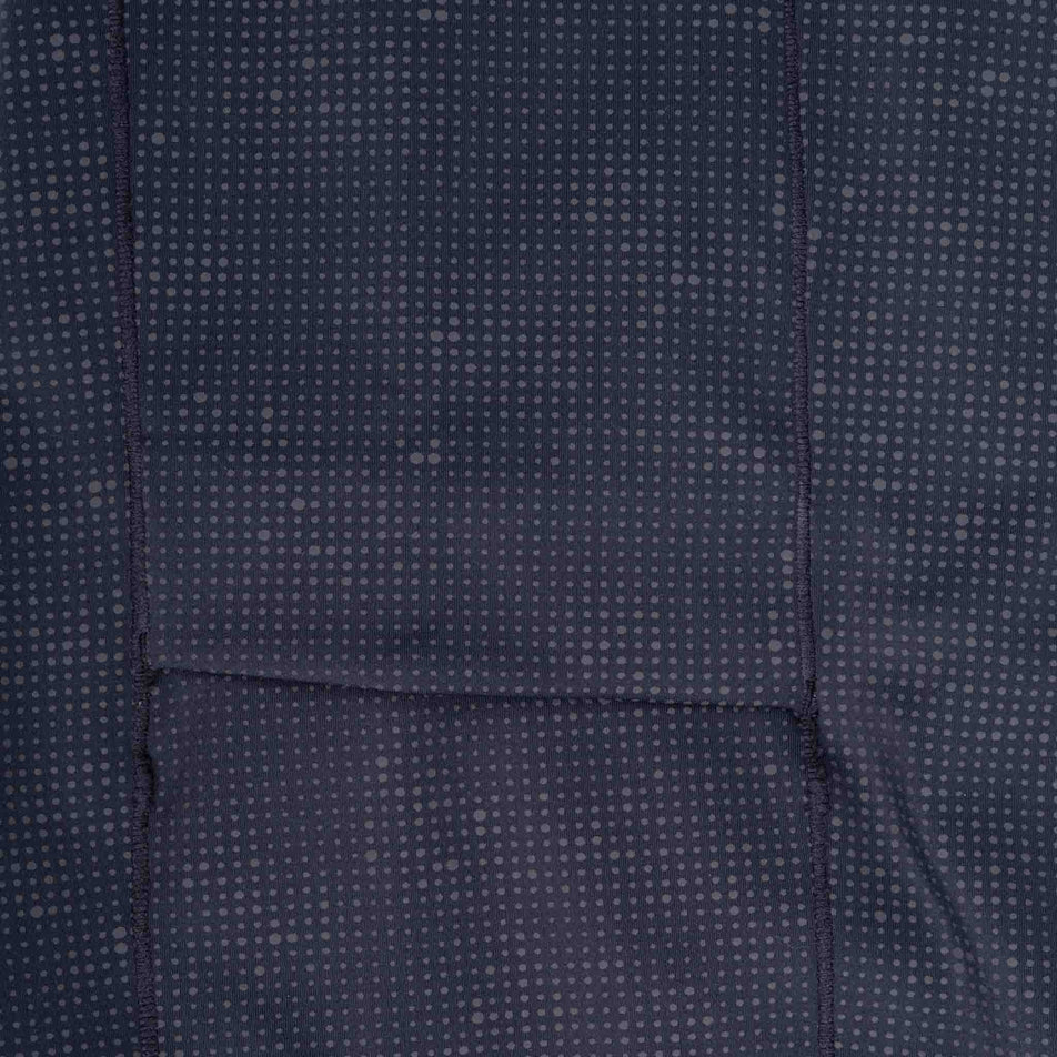 Close-up view of the reflective print on the Ronhill Women's Tech Reflect Lux Tight in the Black/Reflect colourway.