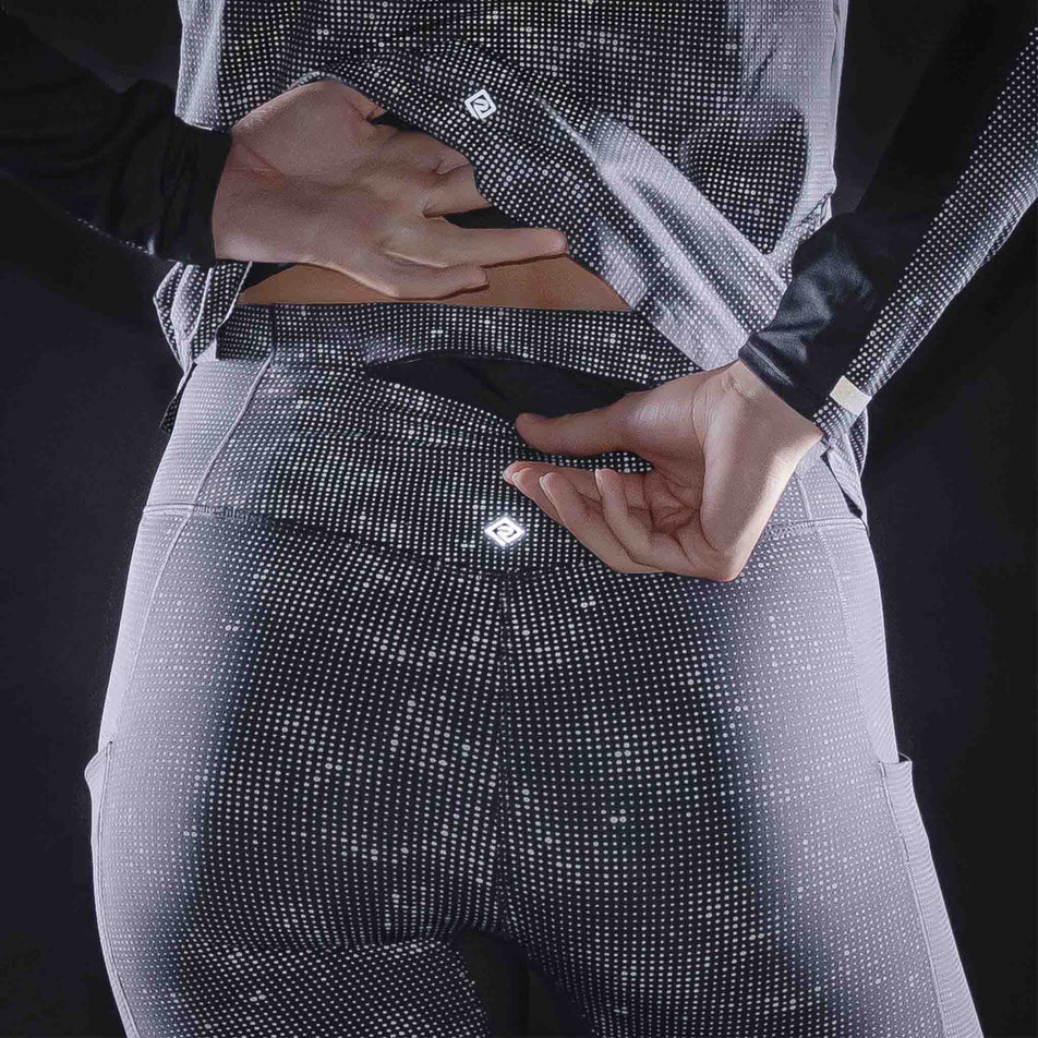 The reflective print on the Ronhill Women's Tech Reflect Lux Tight in the Black/Reflect colourway.