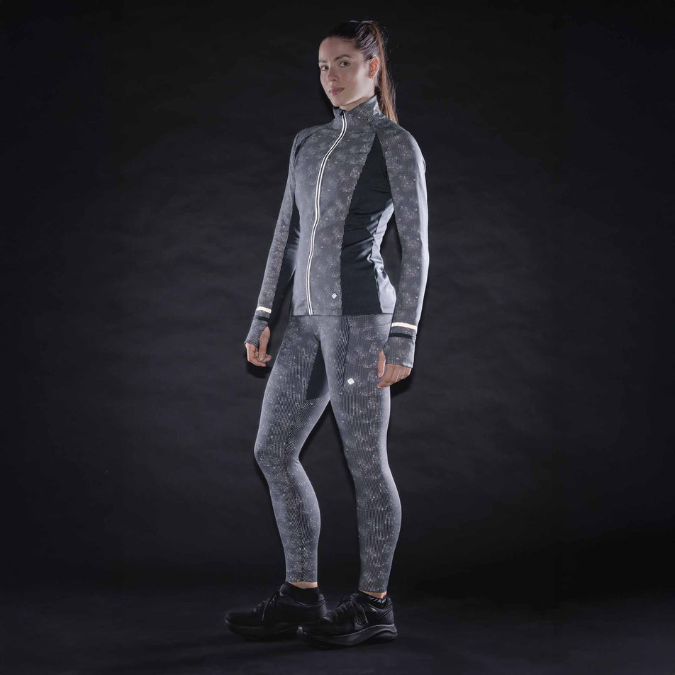 The reflective print on the Ronhill Women's Tech Reflect Lux Tight in the Black/Reflect colourway.