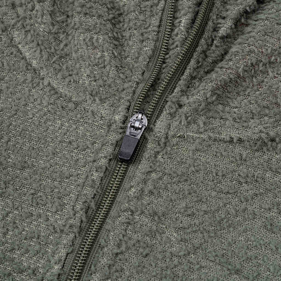 Close-up view of the front zip on the Ronhill Men's Tech Winter Primaloft Hoodie in the Kelp/Zest colourway.