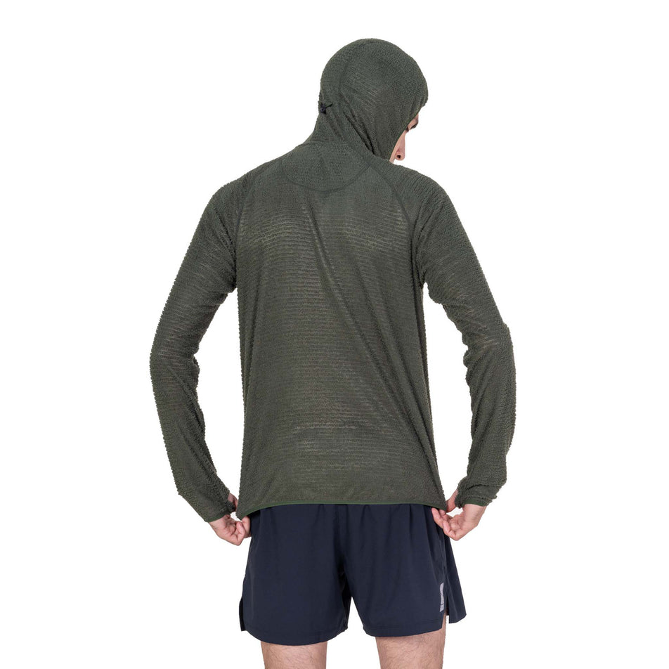 Back view of a model wearing the Ronhill Men's Tech Winter Primaloft Hoodie in the Kelp/Zest colourway.