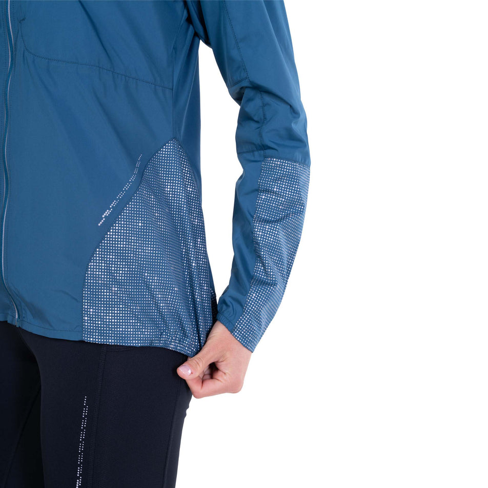 The reflective pattern on the Ronhill Women's Tech Reflect Jacket in the Legion Blue/Reflect colourway.