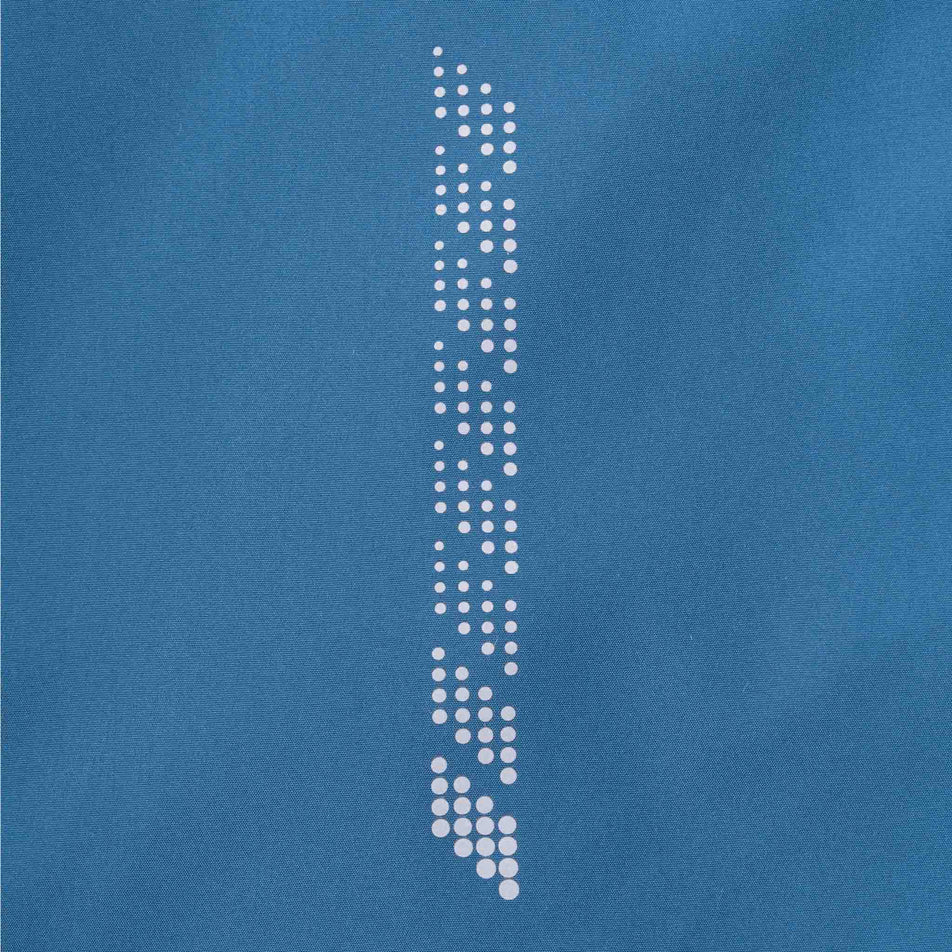 Close-up view of the reflective pattern on the Ronhill Women's Tech Reflect Jacket in the Legion Blue/Reflect colourway.
