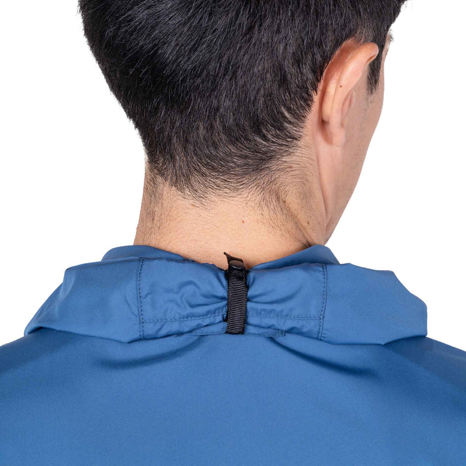 The hood of the Ronhill Men's Tech Reflect Jacket in the Glacier/Reflect colourway rolled away.