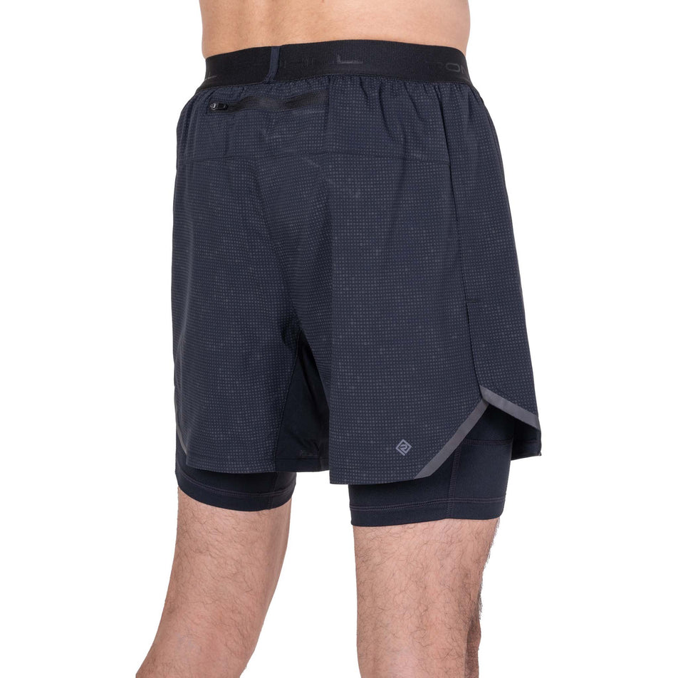 Back view of a model wearing the Ronhill Men's Tech Reflect Lux 5