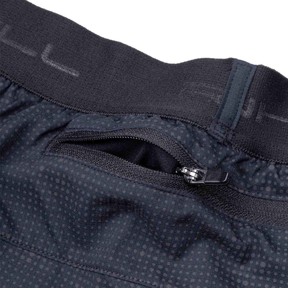 The back zip pocket on the Ronhill Men's Tech Reflect Lux 5