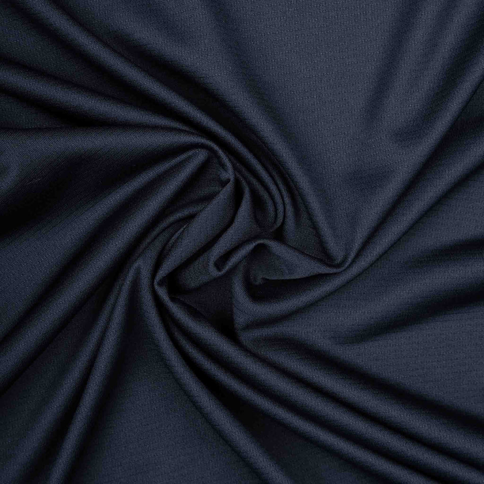 Close-up view of the fabric on the Ronhill Women's Core L/S Tee in the Black colourway.