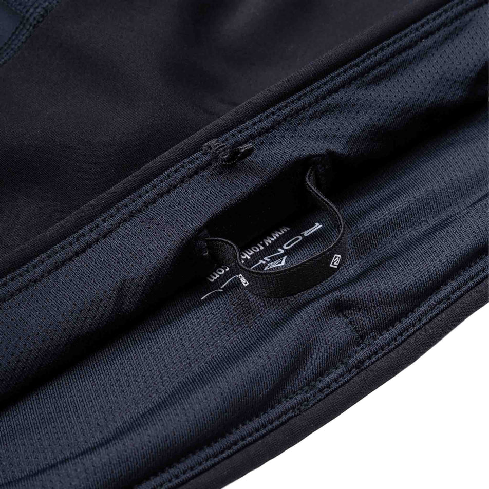 The drawcord on the Ronhill Women's Tech Wind-Block Tight in the All Black colourway.