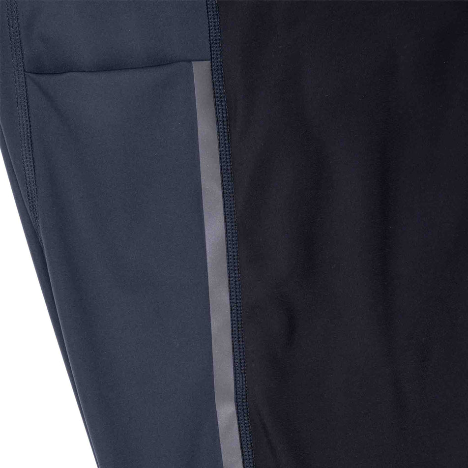 The stash pocket on the side of the Ronhill Men's Tech Wind-Block Tight in the All Black colourway.