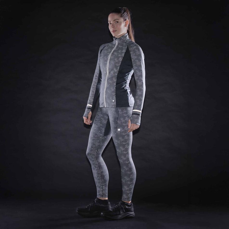 The reflective print on the Ronhill Women's Tech Reflect Lux Jacket in the Black/Reflect colourway.