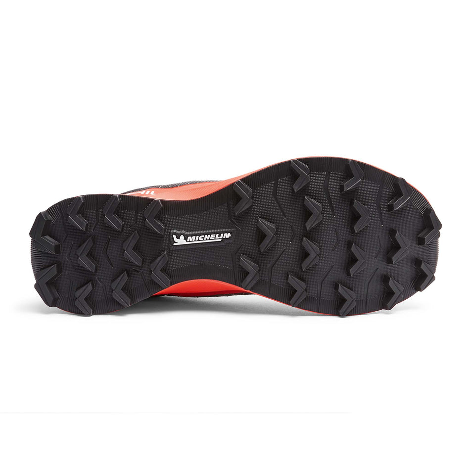 The outsole of the right shoe from a pair of Ronhill Men's Reverence SL Running Shoes in the Black/Red colourway.