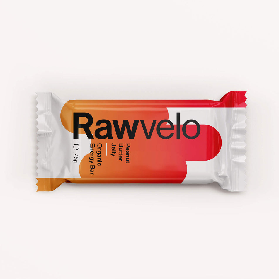 Front of a Rawvelo Peanut Butter and Jelly Organic Energy Bar's packaging (8482644394146)