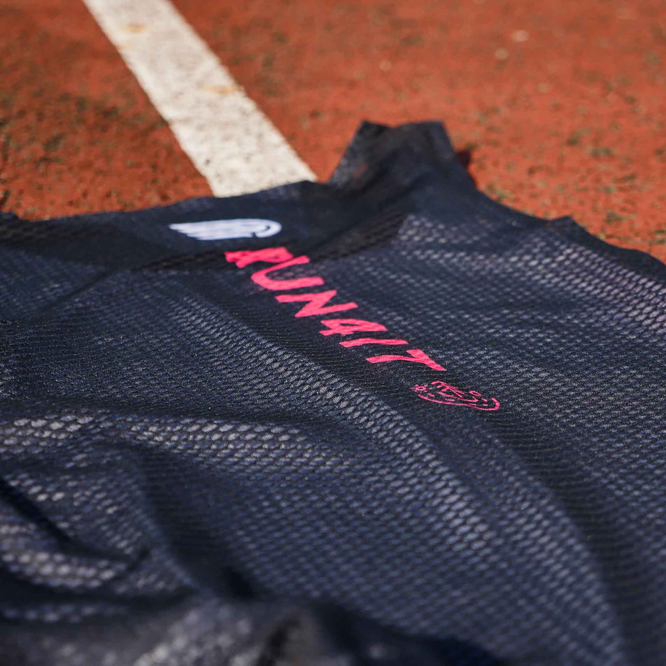 Close-up of the Pressio logo and Run4It branding on the back of the Run4It Run Club Men's Elite Singlet. (8489124266146)