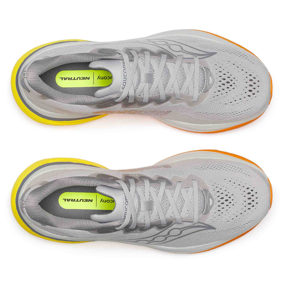 The uppers of a pair of Saucony Men's Ride 19 Running Shoes in the Cadet/Fuego colourway.
