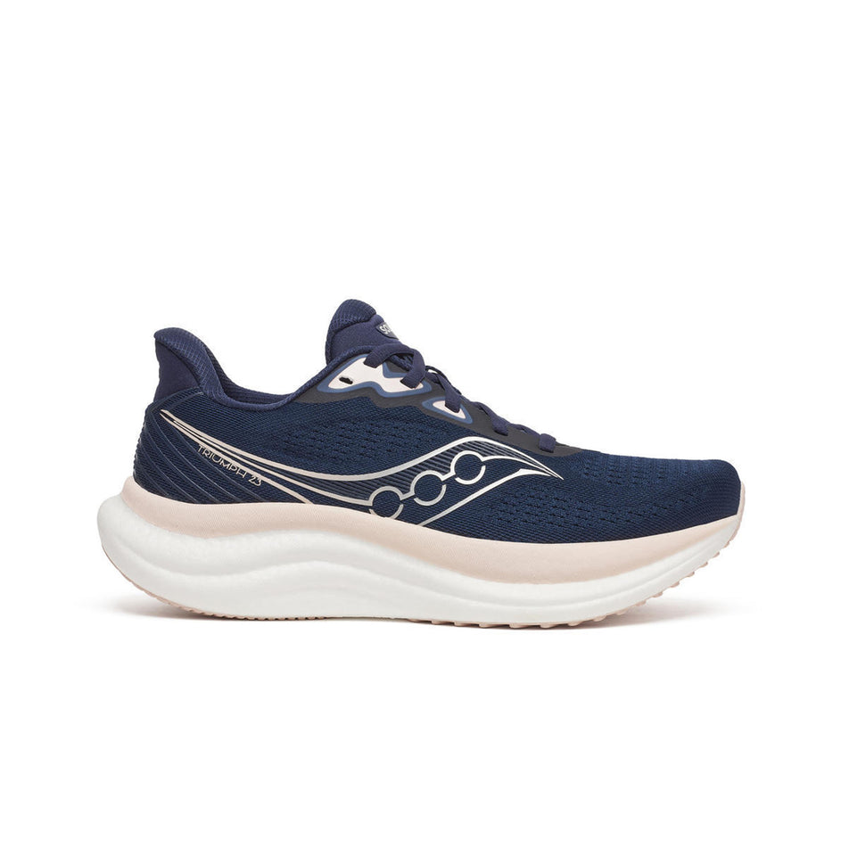 Lateral view of the right shoe from a pair of Saucony Women's Triumph 23 Running Shoes in the Navy/Cameo colourway. (8654990180514)