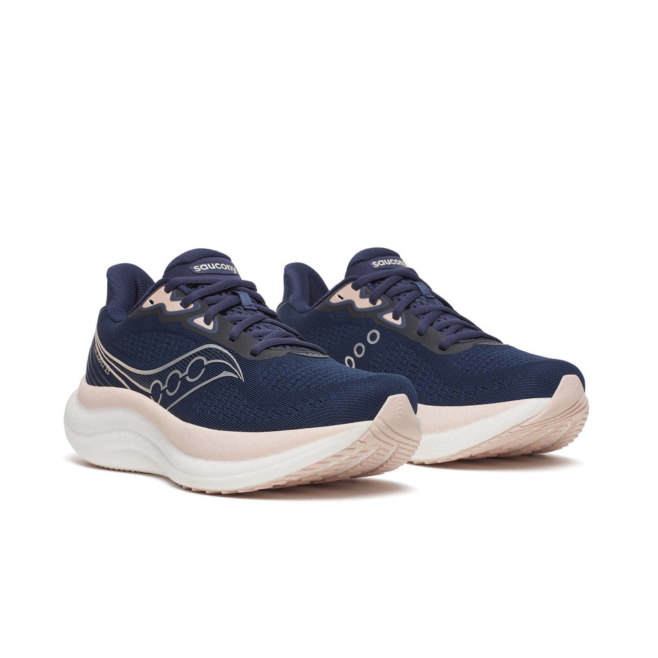 A pair of Saucony Women's Triumph 23 Running Shoes in the Navy/Cameo colourway. (8654990180514)