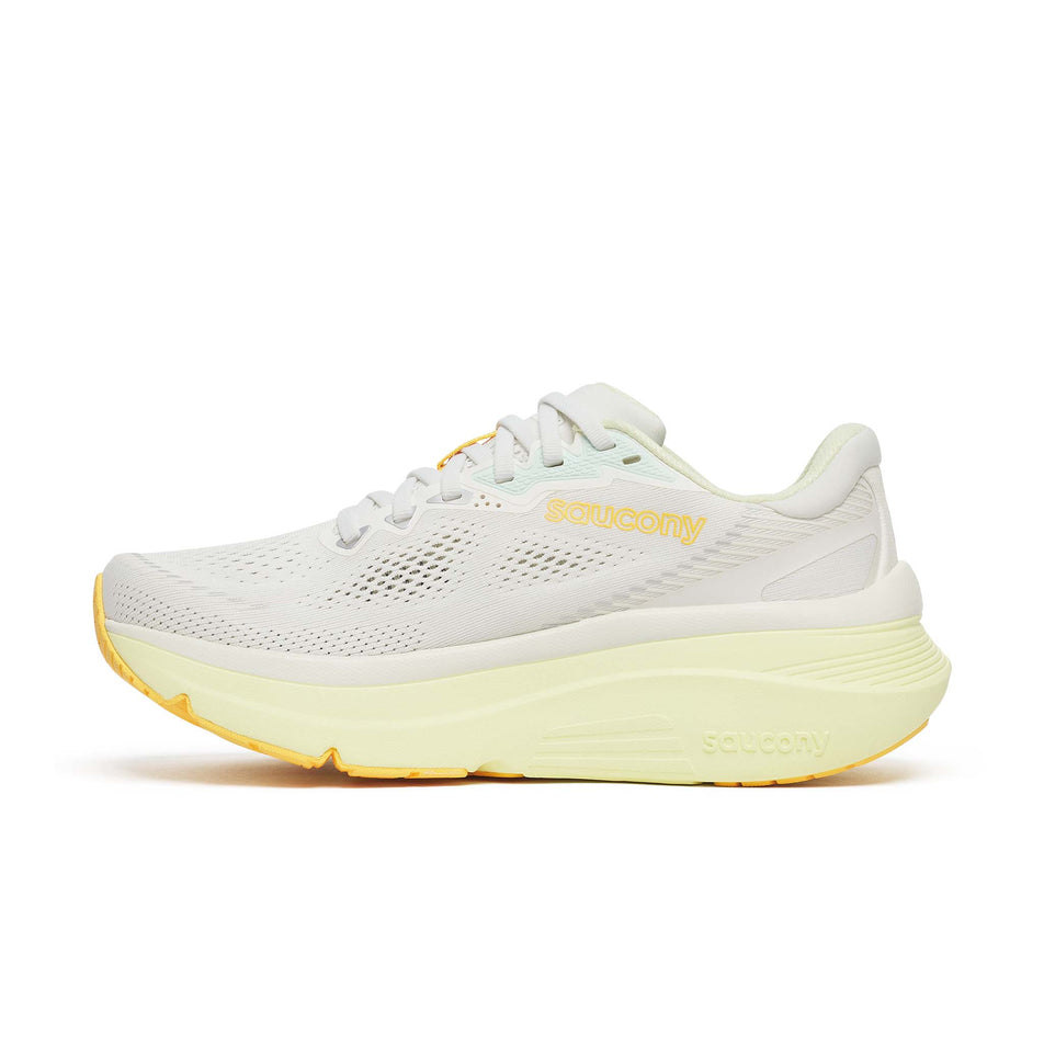 Medial view of the right shoe from a pair of Saucony Women's Guide 19 Running Shoes in the Ivory/Tender colourway.