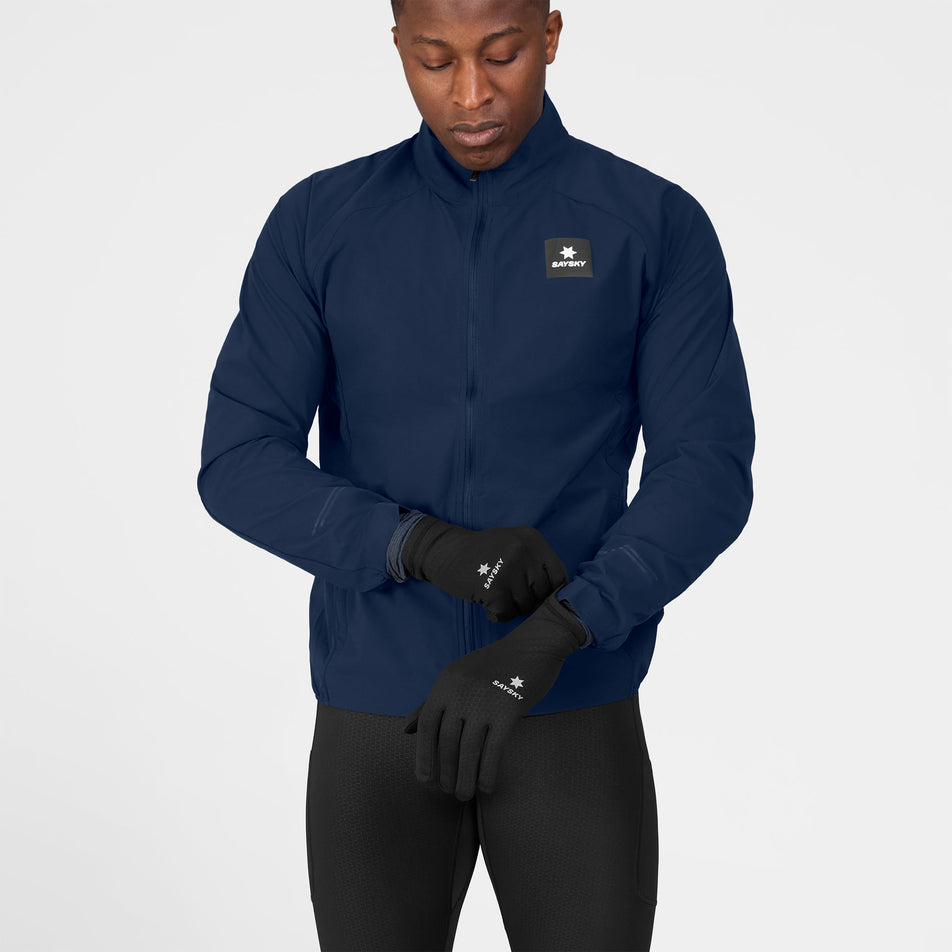 A model wearing a pair of SAYSKY Unisex Combat Gloves in the Black colourway.