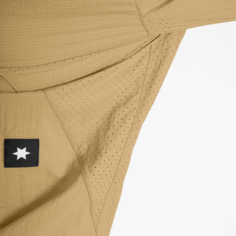 The vents under the arms on the SAYSKY Men's Pace Tech Jacket in the Beige colourway.