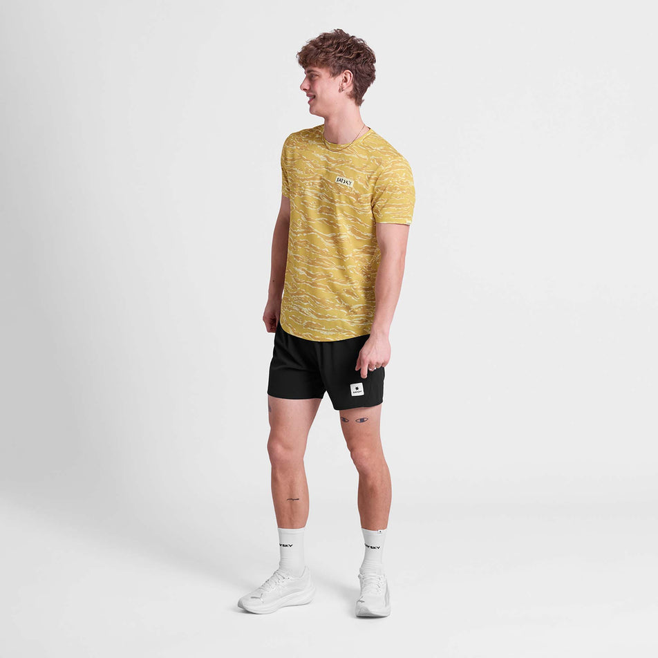 Front view a model wearing the SAYSKY Men's Tiger Combat T-Shirt in the Yellow colourway.