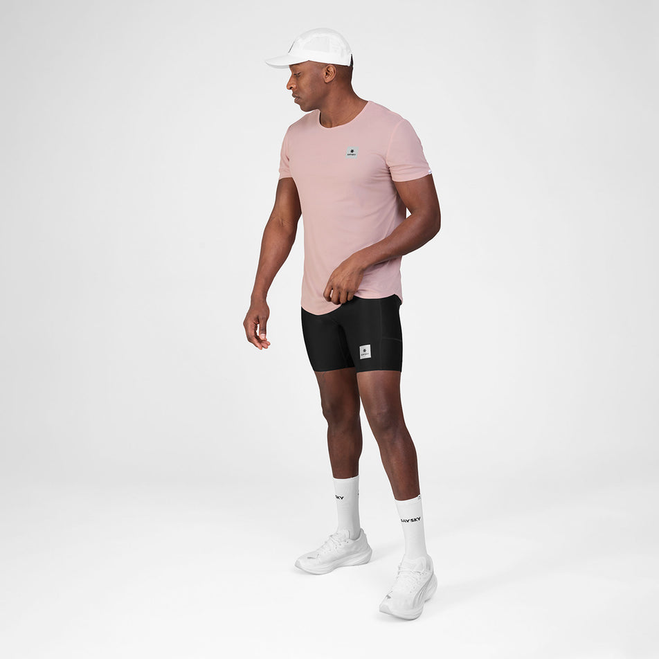 Front view of a model wearing the SAYSKY Men's Reactive Flow T-Shirt in the Pink Logo colourway.