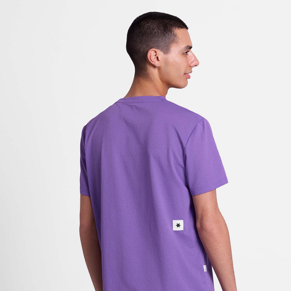 Back view of a model wearing the SAYSKY Men's Universe Combat T-Shirt in the Purple Universe colourway.