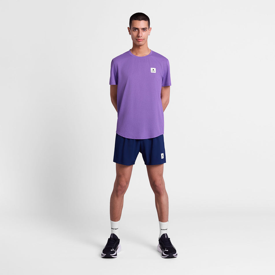 Front view of a model wearing the SAYSKY Men's Universe Combat T-Shirt in the Purple Universe colourway.