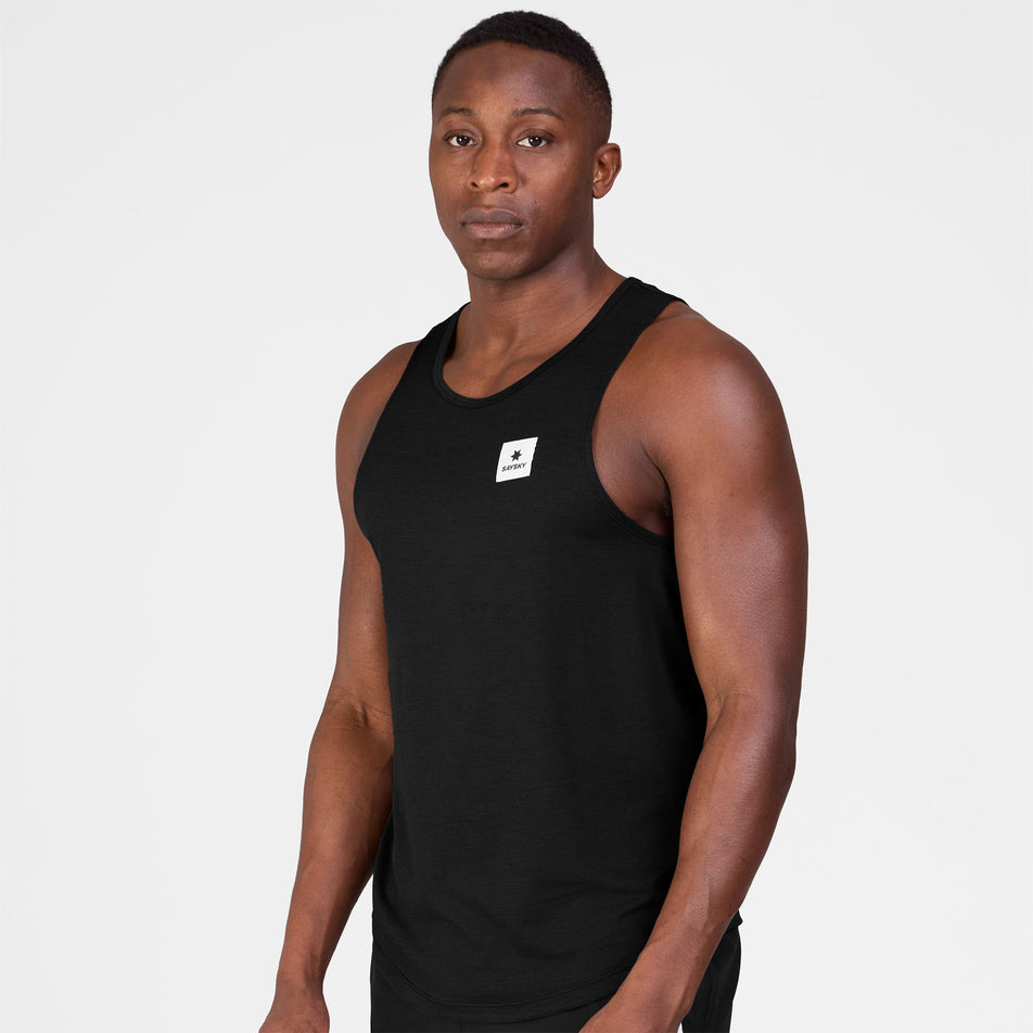Front view of a model wearing the SAYSKY Men's Clean Combat Pro Singlet in the Black colourway.