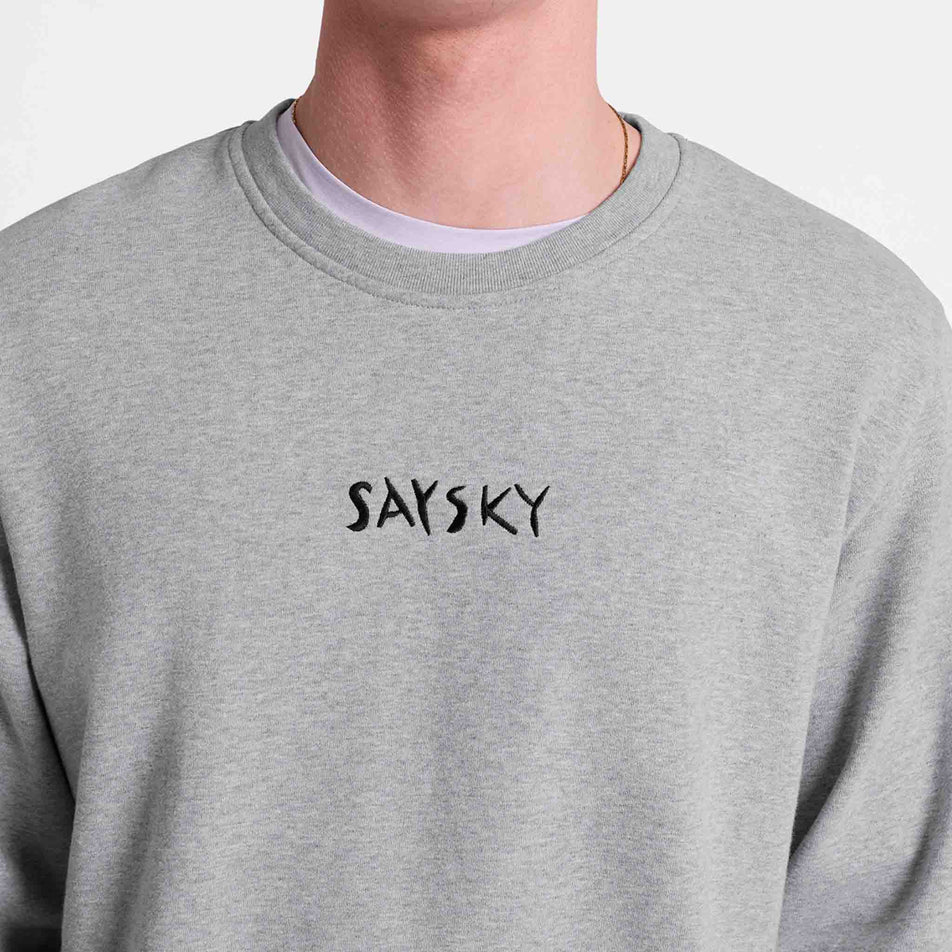 Front view of a model wearing the SAYSKY Men's Tiger Crewneck in the Grey colourway.