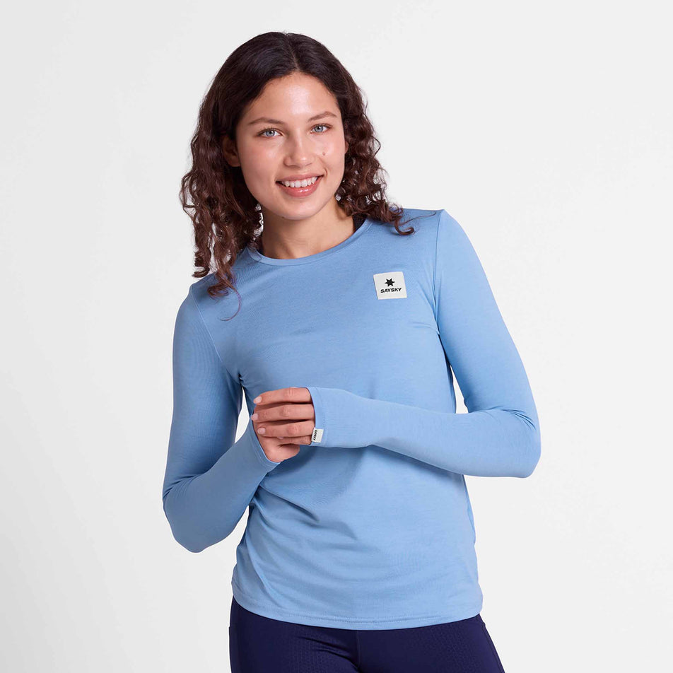 Front view of a model wearing the SAYSKY Women's Clean Pace Long Sleeve in the Blue colourway.