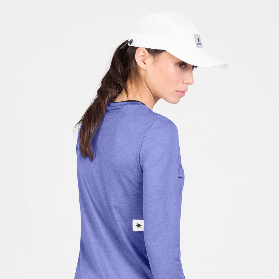 Back view of a model wearing the SAYSKY Women's Clean Pace Long Sleeve in the Purple colourway.