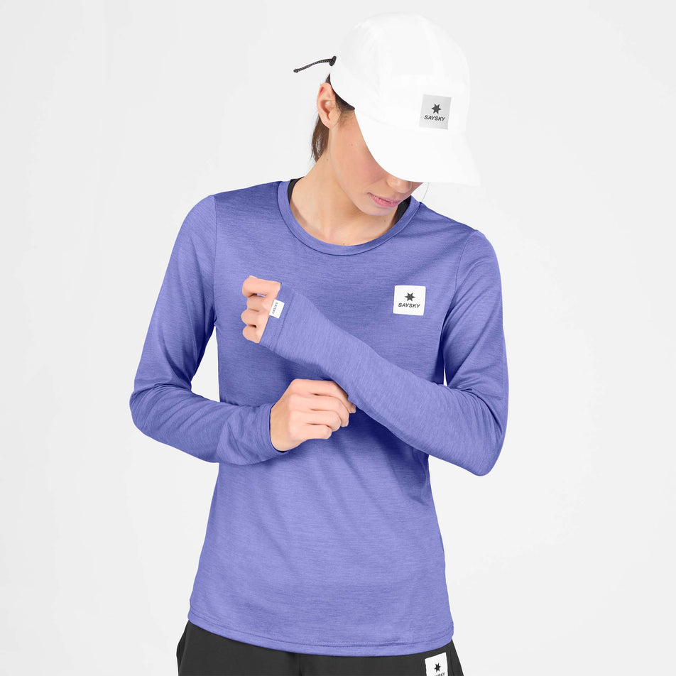 Front view of a model wearing the SAYSKY Women's Clean Pace Long Sleeve in the Purple colourway.