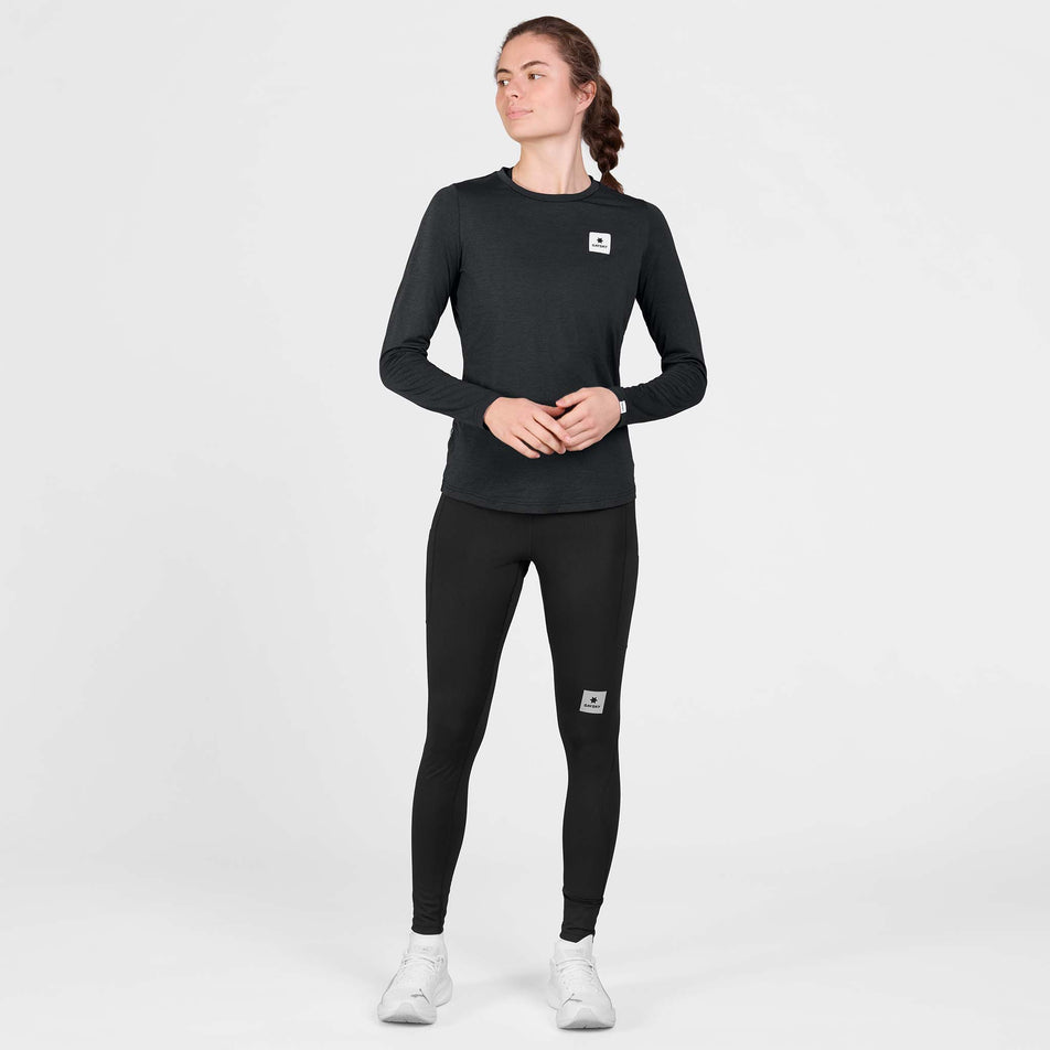 Front view of a model wearing the SAYSKY Women's Clean Pace Long Sleeve in the Black colourway.