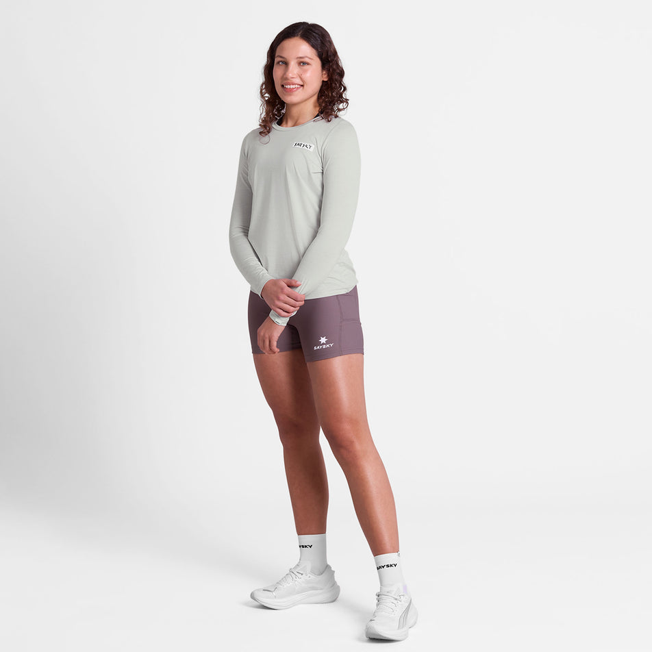 Front view of a model wearing the SAYSKY Women's Tiger Pace Long Sleeve in the Grey colourway.