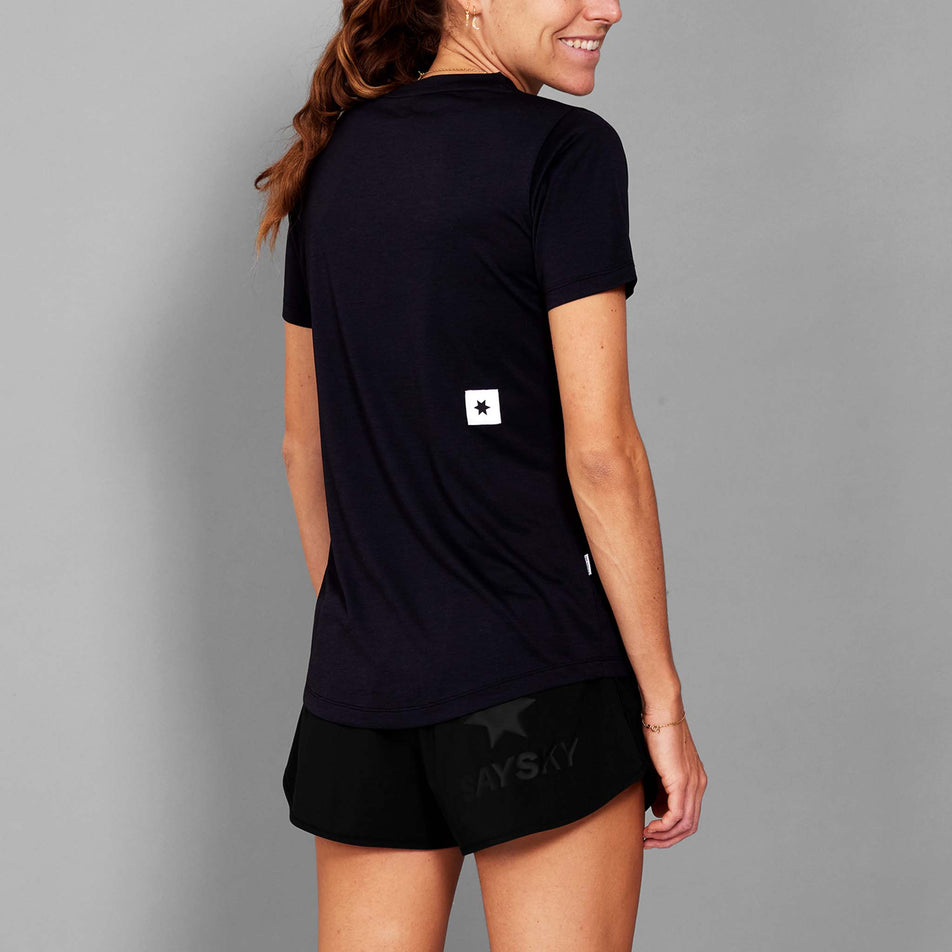 Back view of a model wearing the SAYSKY Women's Clean Combat Pro T-Shirt in the Black colourway.