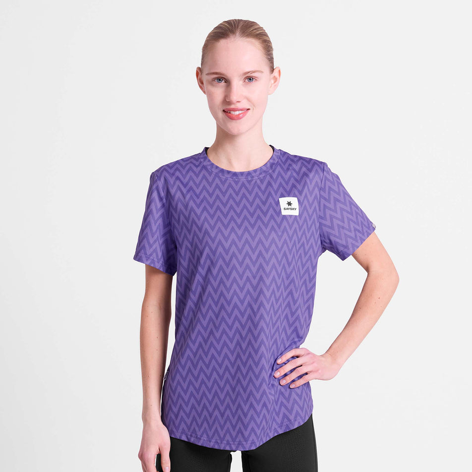 Front view of a model wearing the SAYSKY Women's Zig Zag Combat T-Shirt in the Purple Zig Zag colourway.