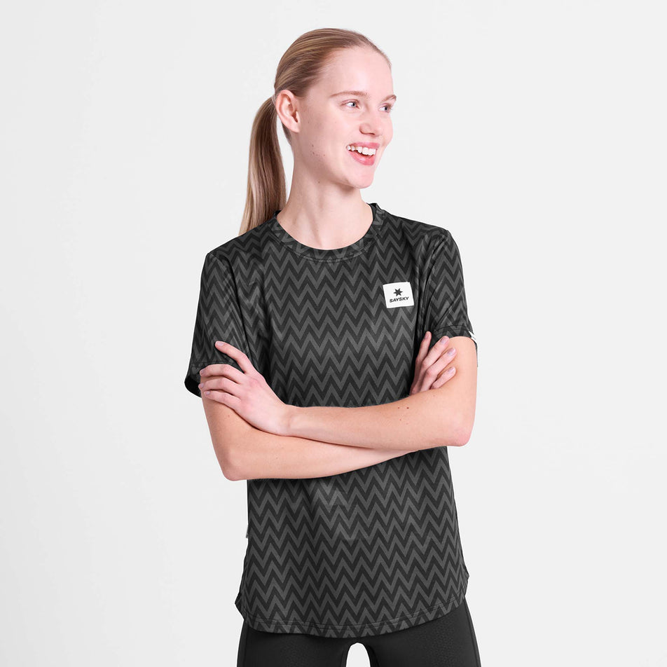 Front view of a model wearing the SAYSKY Women's Zig Zag Combat T-Shirt in the Black Zig Zag colourway.