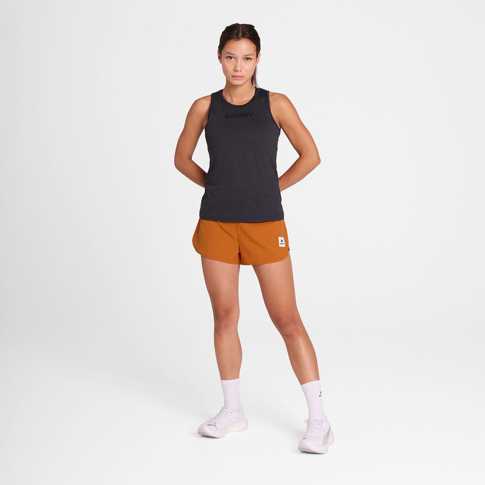 Front view of a model wearing the SAYSKY Women's Logo Pace Top in the Black colourway.