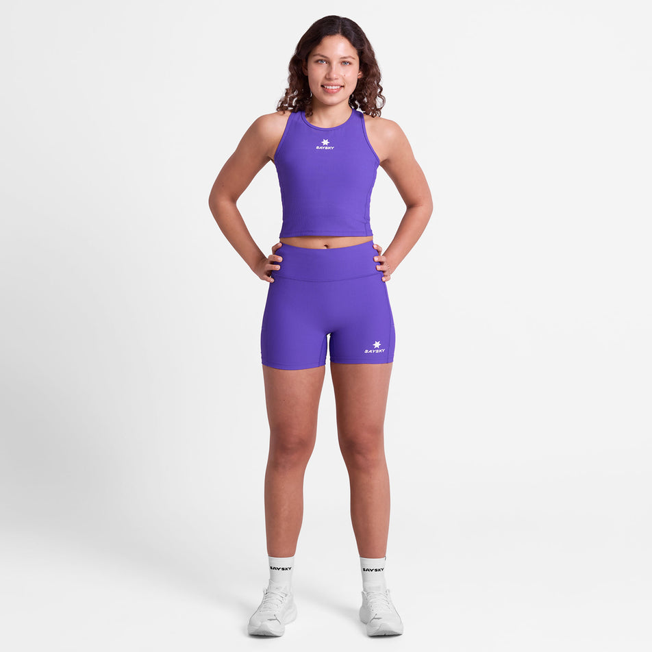Front view of a model wearing the SAYSKY Women's Combat Rib Crop Top in the Purple colourway.