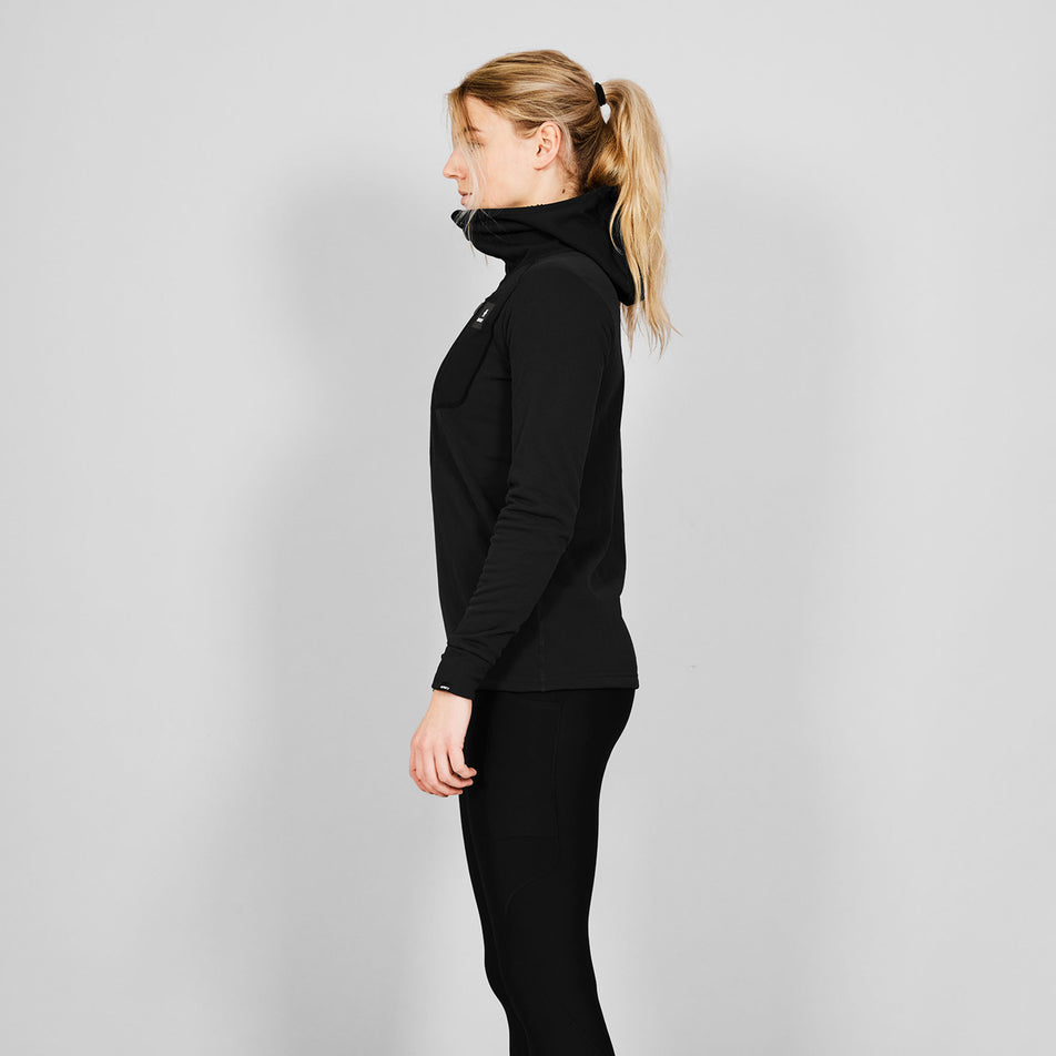 Side view of a model wearing the SAYSKY Combat Half Zip Fleece Hoodie in the Black colourway.