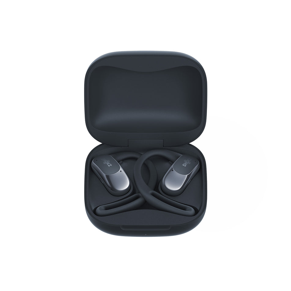 A pair of Shokz Unisex OpenFit Air Headphones, in the Black colourway, inside the charging case. (8541403906210)