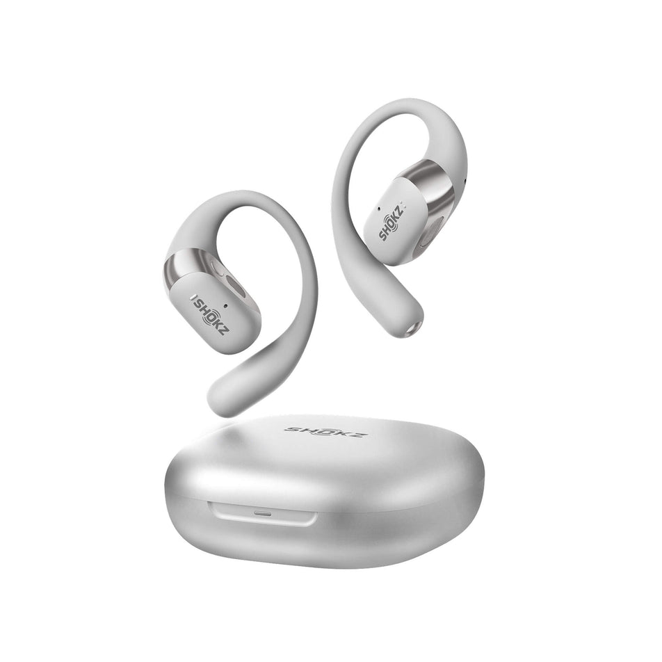 A pair of Shokz OpenFit 2+ Wireless Earbuds and case in the grey colourway