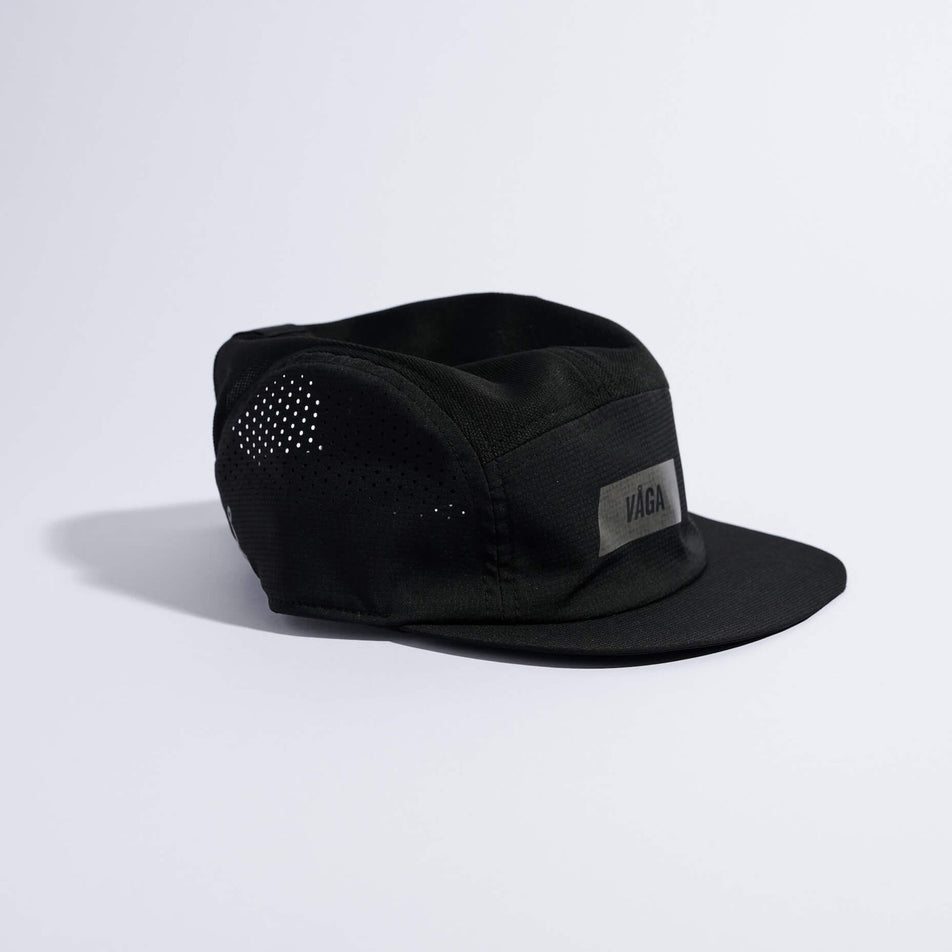 Angled view of the VAGA Unisex Feather Racing Cap in the All Black colourway.