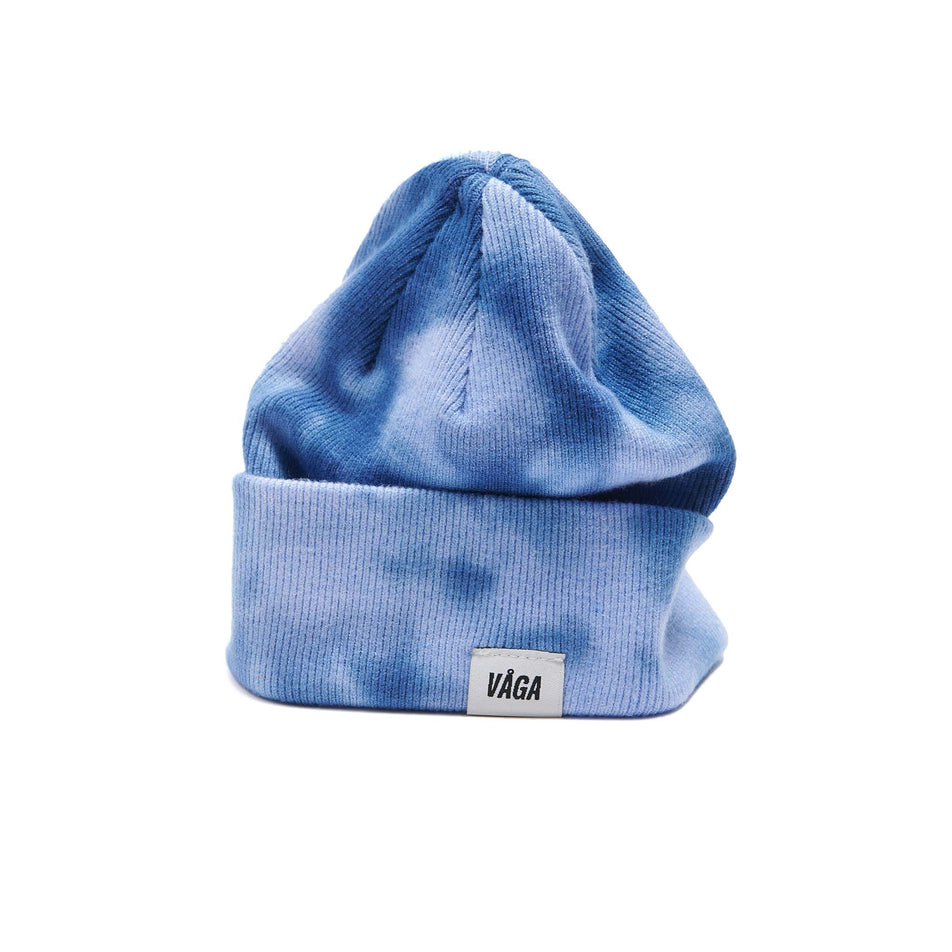 A VAGA Unisex Fine Rib Tie Dye Beanie in the Blue/Postal Blue colourway, with the cuff turned down. (8551972864162)