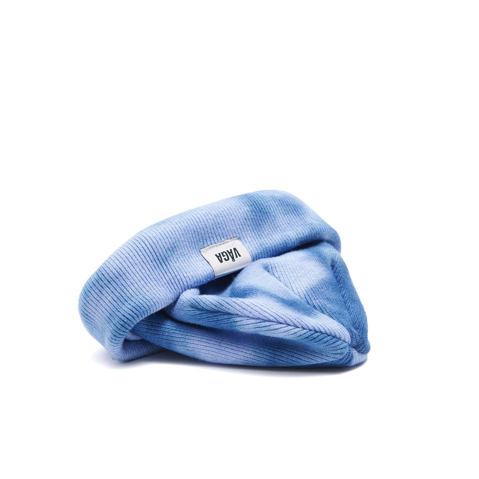 A VAGA Unisex Fine Rib Tie Dye Beanie in the Blue/Postal Blue colourway, with the cuff turned up. (8551972864162)