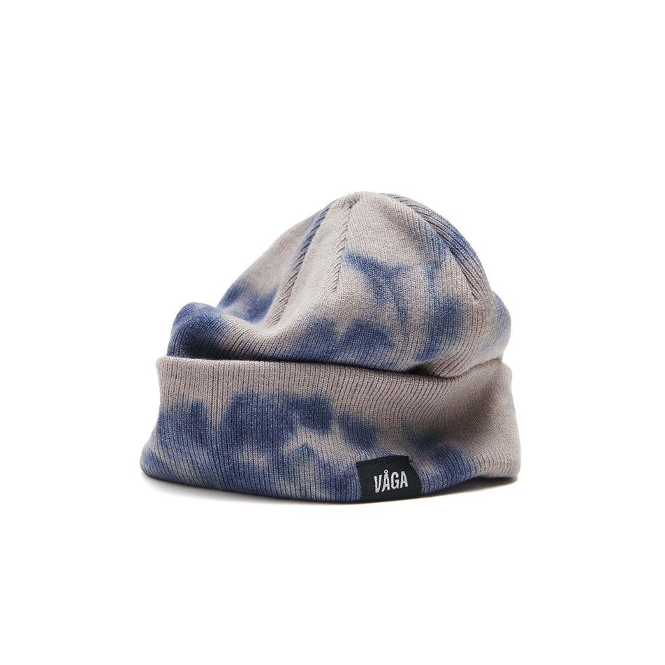 A VAGA Unisex Fine Rib Tie Dye Beanie in the Navy Blue/Dark Taupe colourway, with the cuff turned down. (8551968669858)