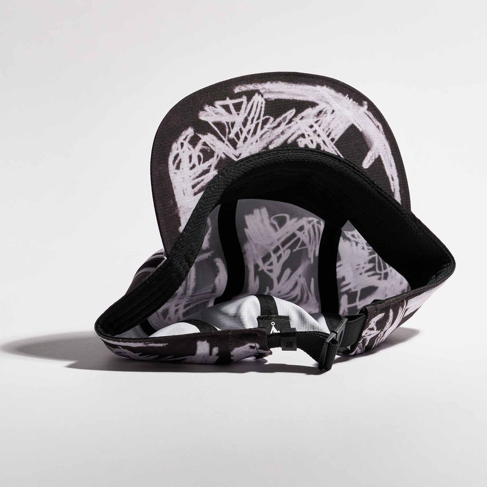 The underside of the VÅGA Unisex Scribble Cap 2.0 in the Black/White colourway.